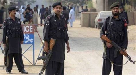 Pakistani Taliban attack a police post in eastern Punjab province killing 1 officer